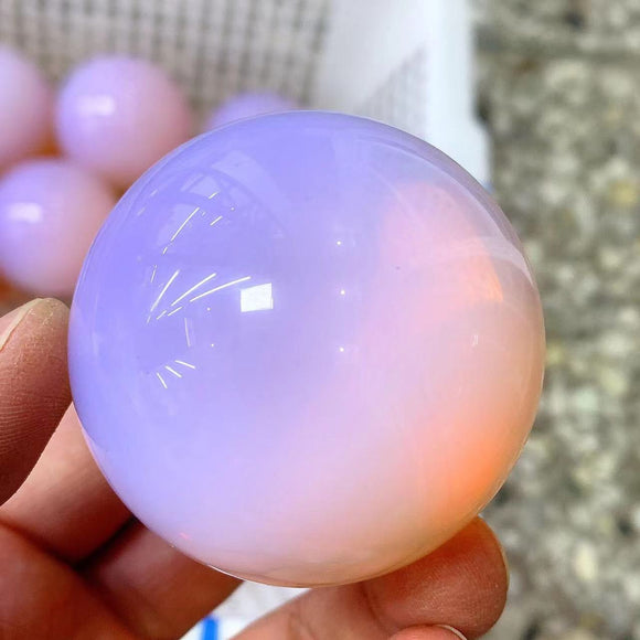 Pink opalite sphere，75 dollars per kilogram.