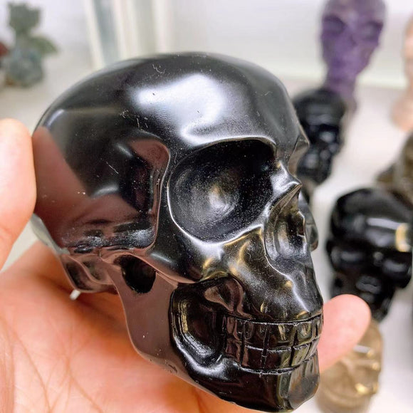Obsidian skull, $25 each.